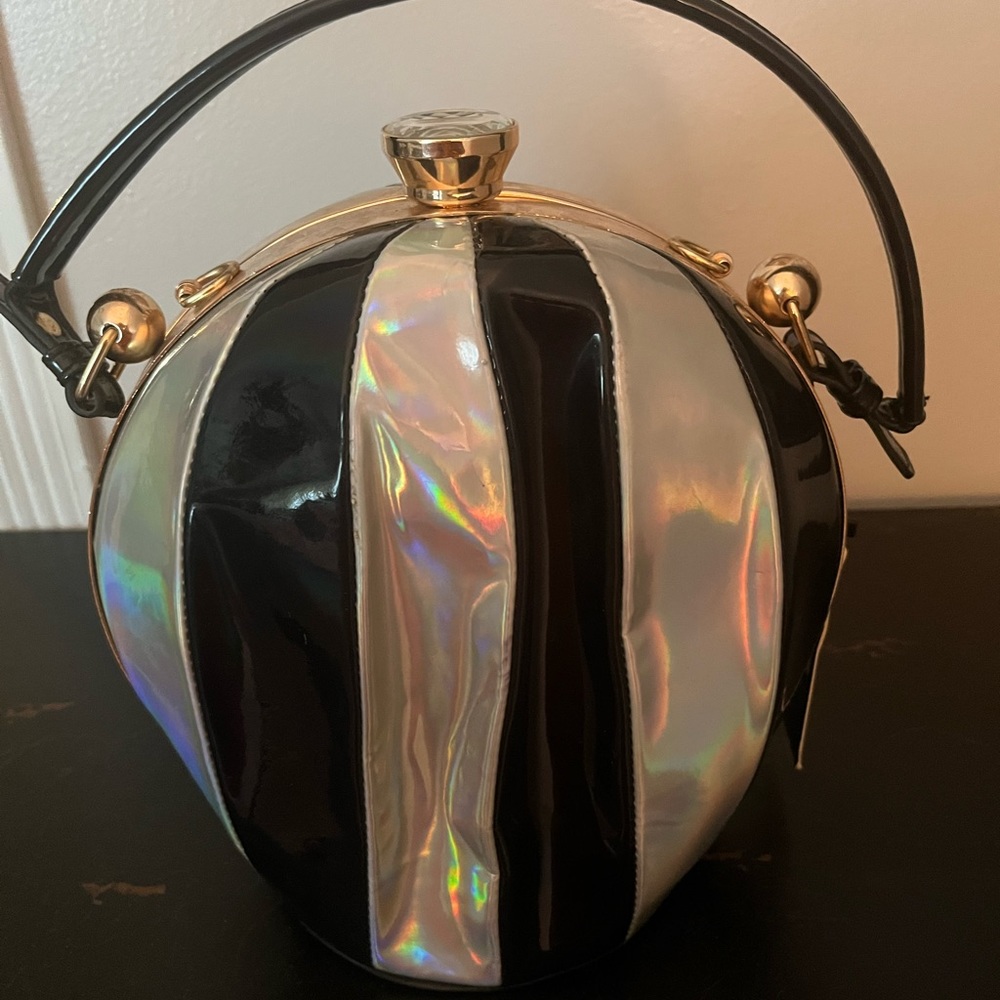 Cute unique “Cowgirl Trendy” purse.  Silver, black, and gold w/ diamond clasp.